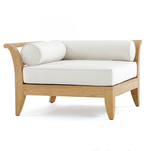 16765dp aman dais teak sectional corner base front view with two bolster pillows and a seat cushion in canvas color on a white background