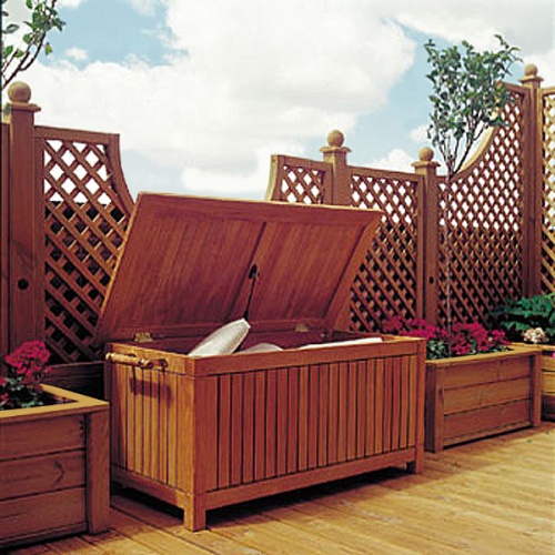 18203 somerset storage box on wood deck with flower boxes on both sides and lattice fence in background