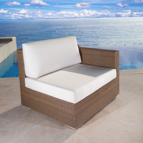 31004 malaga synthetic wicker left side sectional with canvas cushions angle view on pool deck with pool and ocean background