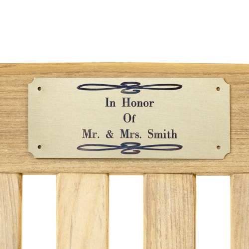 42000 Personalized Plaque in brass on back of bench on white background