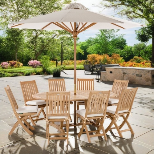 70060 Barbuda Martinique 9 piece oval Dining Set of 8 folding side chairs with optional seat cushions and a oval teak table showing optional open market umbrella on white background