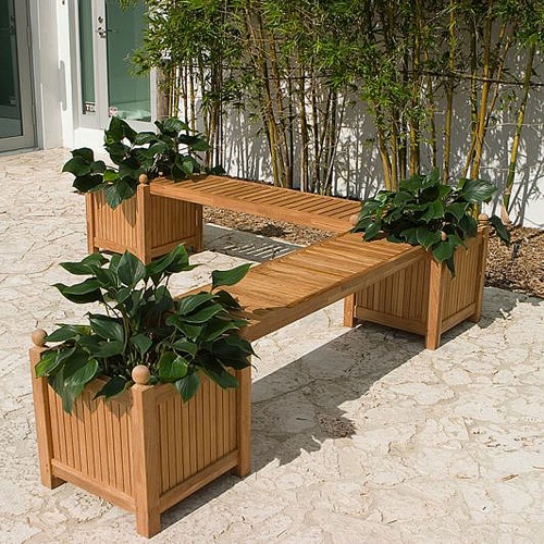 70070 double planter bench set of three teak planters and two teak bench panels on concrete patio with shrubs and sliding glass doors in background