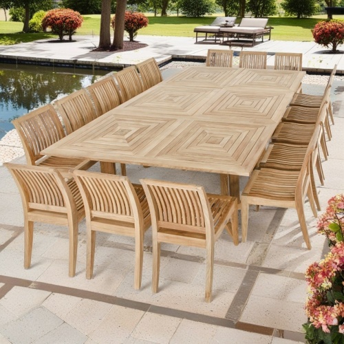 70288 Pyramid 19 piece Teak Dining Table seats 16 angled view on white background