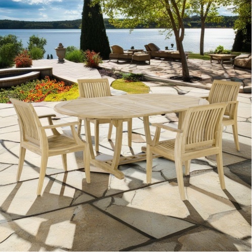 70305 Martinique 5 piece Dining Set angled side view on stone patio with lake and trees in background
