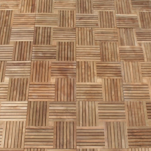 70403 parquet teak tiles fifty cartons covering five hundred thirty five square feet assembled on floor