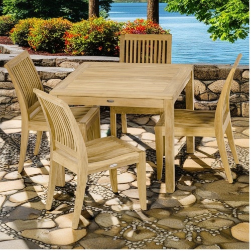 70554 Laguna 5 piece Square Dining Set of 4 teak side chairs and a 36 inch square teak table angled view on white background