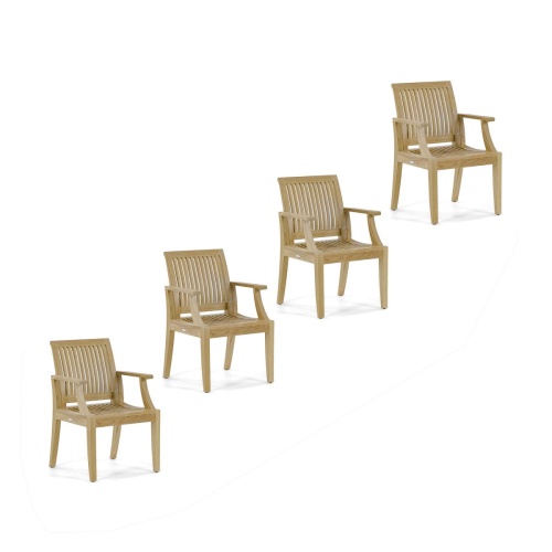 70886 Laguna Armchair Set of 4 Laguna Armchairs on stone paver pool deck with pool and garden courtyard home in background