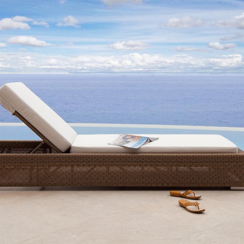 73002MTO Malaga Chaise Lounger Cushion canvas color on Malaga Chaise Lounger on concrete deck side view in front of pool with ocean and blue sky in background