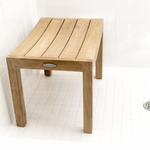 18625 Pacifica Stool side view in a shower on white tile