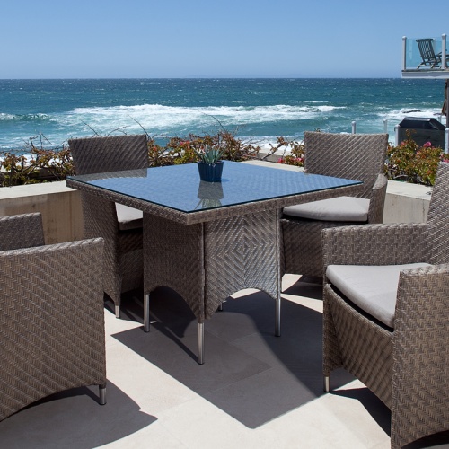 Valencia Square Table with 4 Valencia Armchairs overlooking ocean