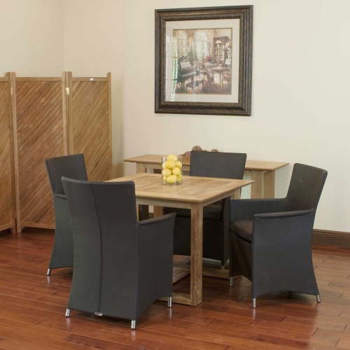 70235 Horizon Apollo 5 piece Dining Set of Horizon teak 39 inch square dining table and 4 Apollo chairs in tobacco color on wood floors a picture on wall and privacy screen in back