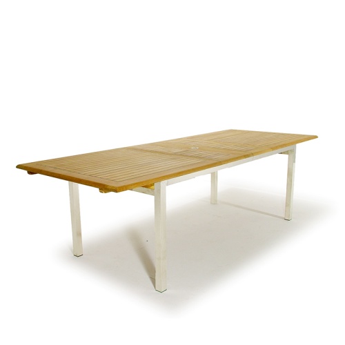 70247 Vogue teak and stainless steel extension rectangular dining table angled end view on white background