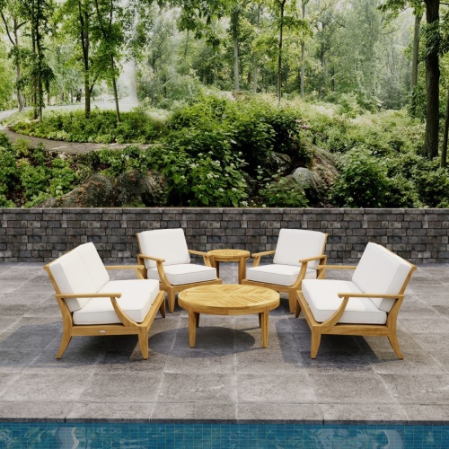 70347 Laguna 6 pc Sofa Set on paver patio front view facing a pool and stone fence with woods and trail in background