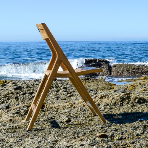 70465 Surf Pyramid folding side chair right side view on beach facing ocean and blue sky