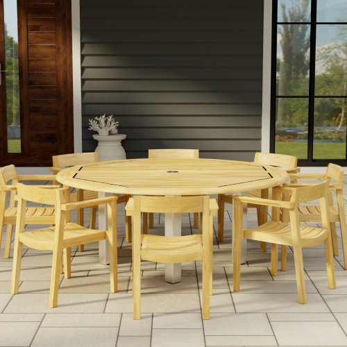 70487 Horizon Vogue Teak Dining Set for 8 of Vogue 6 ft Round Dining Table and 8 Horizon Dining Chairs angled side view on tiled patio with door and window in the background 