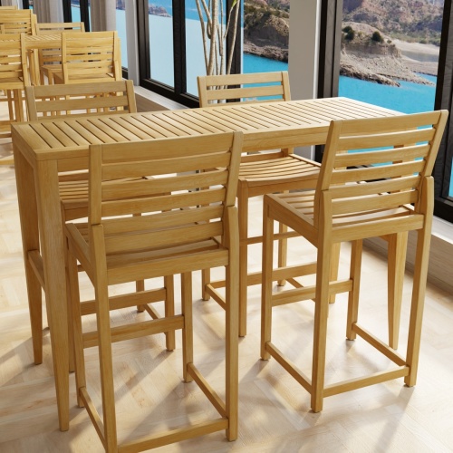 70649 Laguna Somerset Side Barstool Set in a hospitality setting next to a wall of windows overlooking the ocean