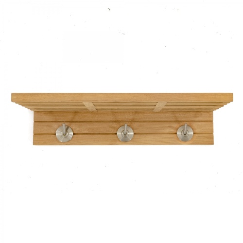 18730 Pacifica Towel Shelf front view hanging on wall showing hooks on white background
