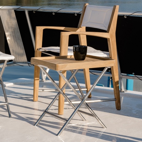 Image of 28815TRAY Odyssey Serving Tray with stand and Odyssey folding Director Chair on boat deck