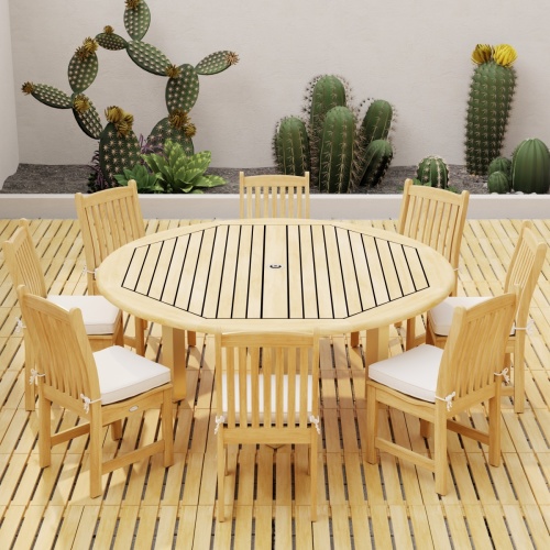 70492  Vogue Veranda Dining Set of Vogue 6 ft Round Table and 8 Veranda Side Chairs with optional seat cushions on teak tiled patio in front of a wall and cactus plants in background