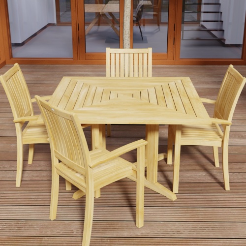 70685 Sussex Pyramid 5 pc Dining Set of Pyramid Square Dining Table and 4 Sussex Armchairs in angled top view on wood deck with door to house in background 