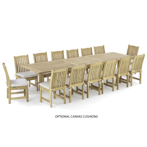 70787 Grand Laguna 15 piece Teak Dining Set of 14 Laguna Side Chairs with optional canvas seat cushions and Rectangular 11 foot Teak Table end angled on white background