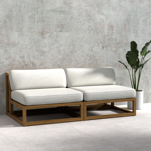 70821 Maya Armless Love Seat showing 2 Maya Slipper Chairs in angled front view on tile next to a potted plant with a wall in the background