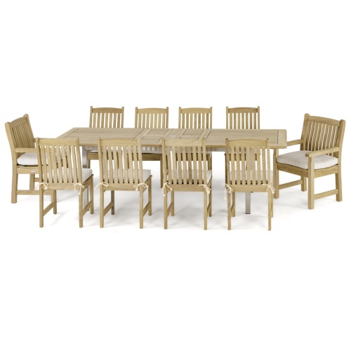 70826 Vogue Veranda thirteen piece Dining Set of 2 teak dining armchairs 10 side chairs and rectangular teak and stainless steel dining table side view on white background