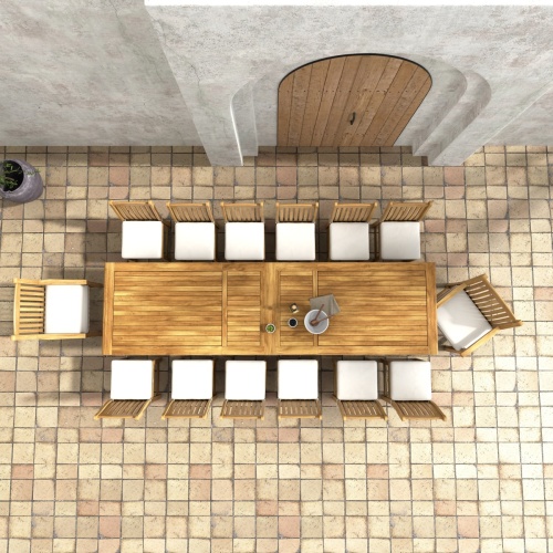 70361 Grand Laguna 15 piece teak Dining Set of 12 teak dining chairs with optional seat cushions around a teak rectangular extendable dining table in an aerial view on patio and entry door in background 