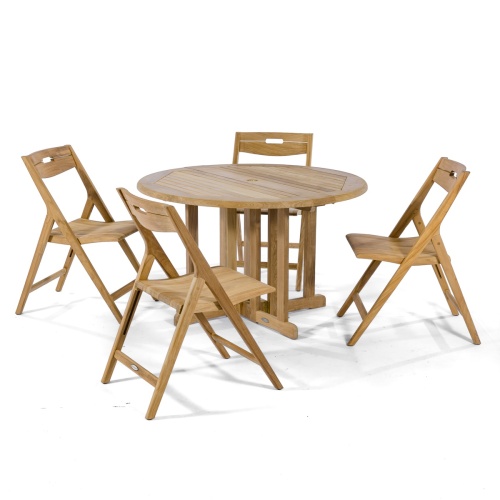 70474 Surf Barbuda Folding Dining Set of 4 folding teak side chairs and 48 inch round dining table side angled view on white background