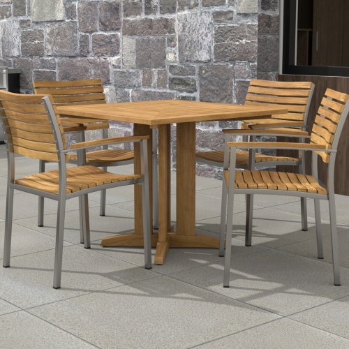 70575 Vogue Pyramid 5pc Dining Set in angled corner view of table top on patio with a stone wall in background