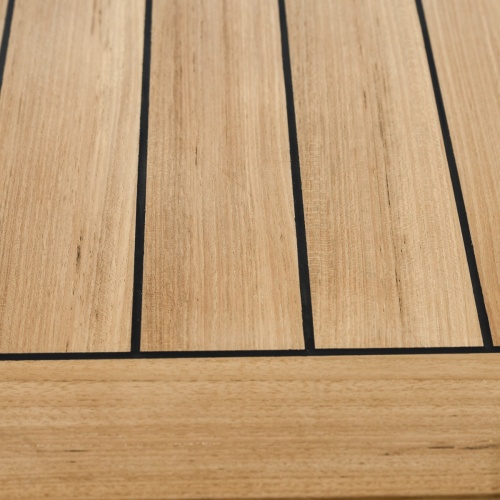 70642 Vogue Laguna rectangular teak and stainless steel bar table closeup view of table top showing sikaflex marine sealant between table slats on white background
