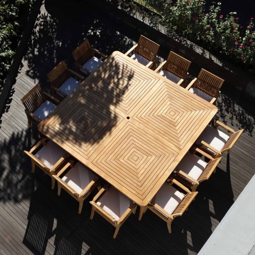 70802 Pyramid Sussex 13 piece Dining Set of 12 Sussex dining armchairs and optional cushions and a Pyramid 8 foot square teak dining table aerial view on outdoor wood deck