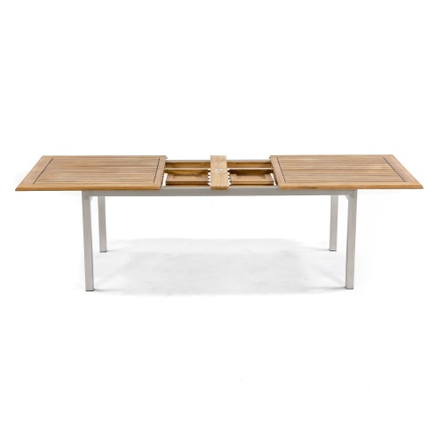 70176 Vogue stainless steel and teak rectangular dining table pulled open showing leaf extensions on white background
