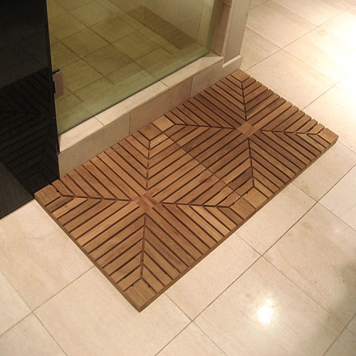 70411 Diamond Teak Tiles showing two tiles as a shower spa bath mat on tile floor in bathroom