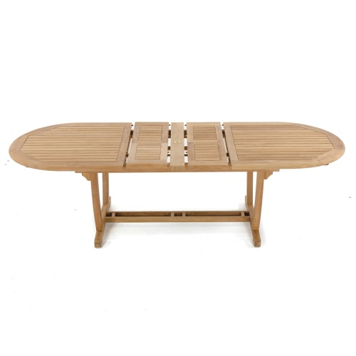70516 Montserrat Surf teak oval dining table showing double butterfly leaves extended side angled view on white background