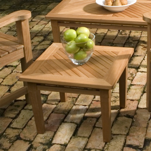 14125 Brighton Teak Side Table with glass bowl of green apples on table top aerial side view on a paver patio