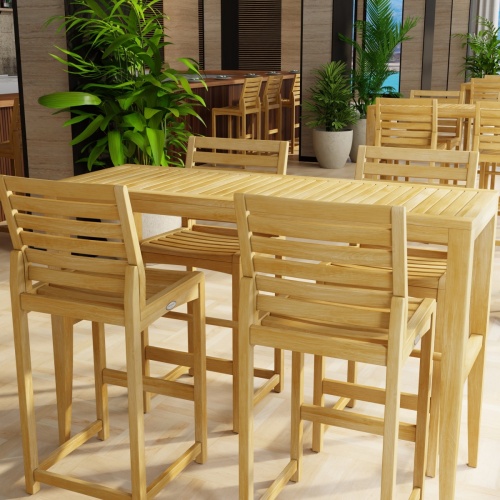 70649 Laguna Somerset Side Barstool Set in a hospitality setting showing 2 sets in angled side view surrounded by potted plants 