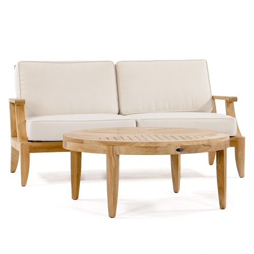13152dp laguna teak loveseat with canvas colored cushions and coffee table front facing on white background