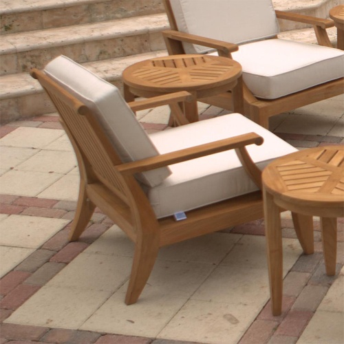 12152 laguna teak chair set with cushions in circular setting on outdoor paver patio close up aerial view 