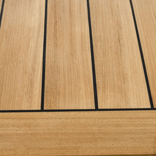 70055 Vogue teak and stainless steel rectangle dining table with sikaflex marine sealant between teak slats close up of table top