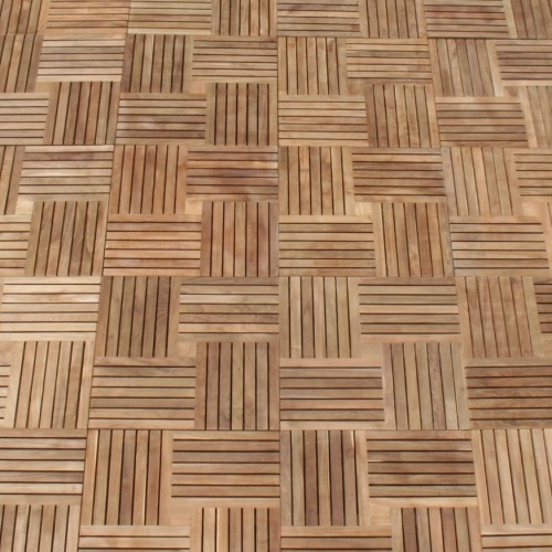 18411 parquet teak tiles assembled together on a floor showing pattern