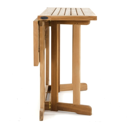 70165 Nevis Veranda teak folding table angled view end of table with one side dropped down on white background