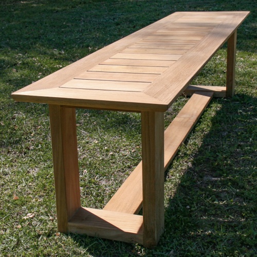 13909 Horizon teak 6 foot long Backless Bench end view of bench on grassy area
