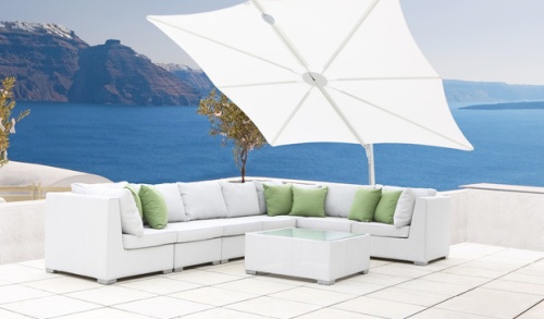 sps25100ffb spectra solo umbrella only on outdoor terrace over sectional and coffee table against concrete balcony with land ocean and blue sky in background