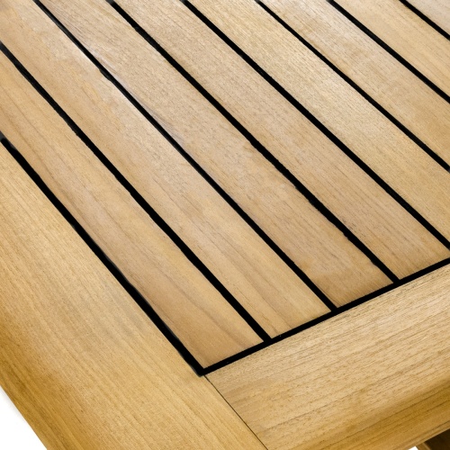 70176 Vogue stainless steel and teak dining table close up view showing sikaflex marine sealant between teak slats of table top