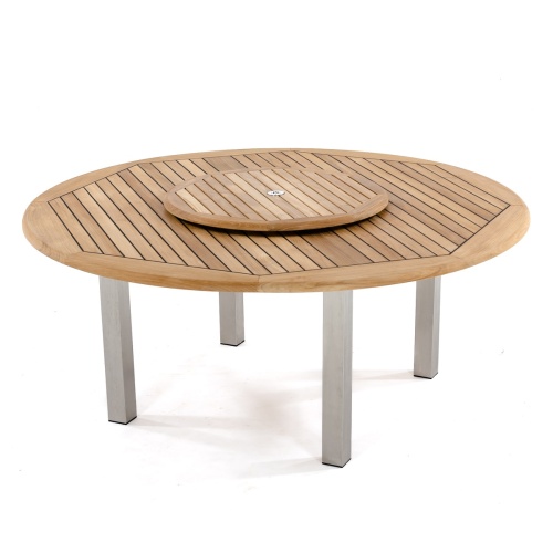 25015 Vogue teak and stainless steel round table showing optional teak lazy susan in umbrella hole in side angled view on white background