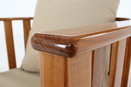 Closeup view of armrest of the Kafelonia Chair in marine grade finish on white background.