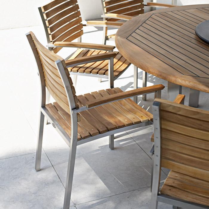 alt="22007ST Vogue Dining Chair right side on concrete patio"