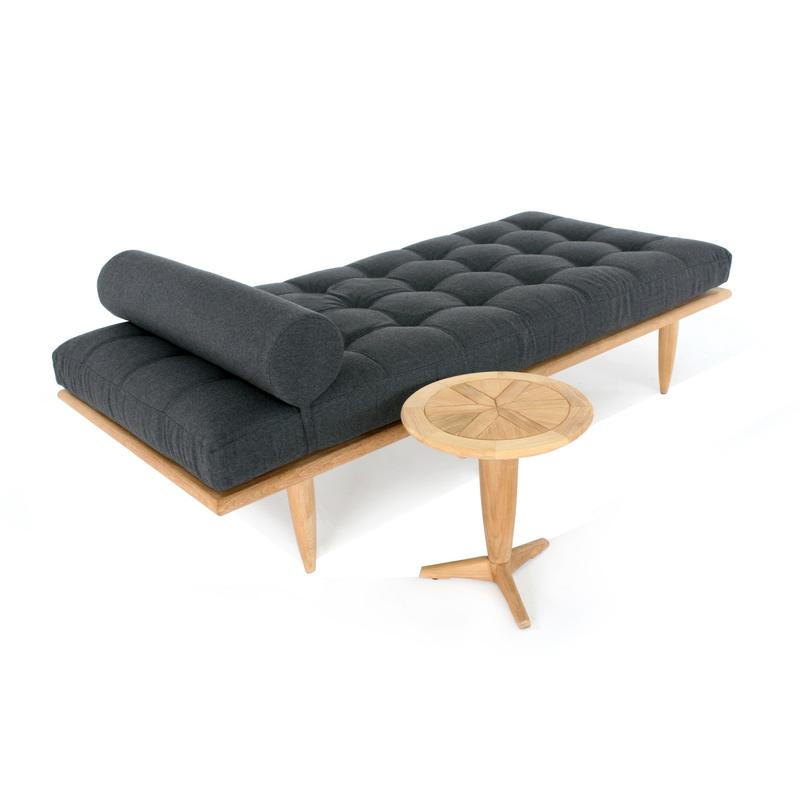 alt="14815 saloma teak side table next to saloma daybed set side angled view on white background "