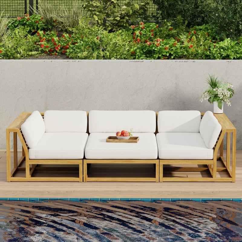 alt="70274 Maya 3pc Daybed on patio in aerial front view with tray of fruit on middle daybed section facing a pool next to a potted plant with privacy wall with shrubs and trees in background"